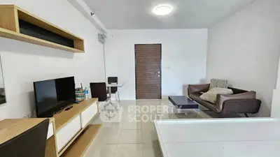 Modern living room with sleek furniture and minimalist decor, perfect for urban living.