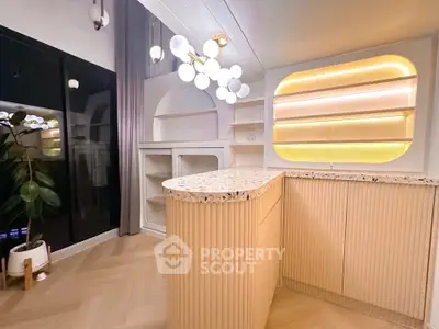 Modern kitchen with elegant lighting and terrazzo countertop