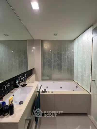 Luxurious bathroom with modern fixtures and spacious bathtub