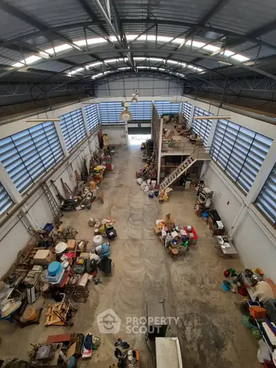 Spacious industrial warehouse with high ceilings and ample storage space