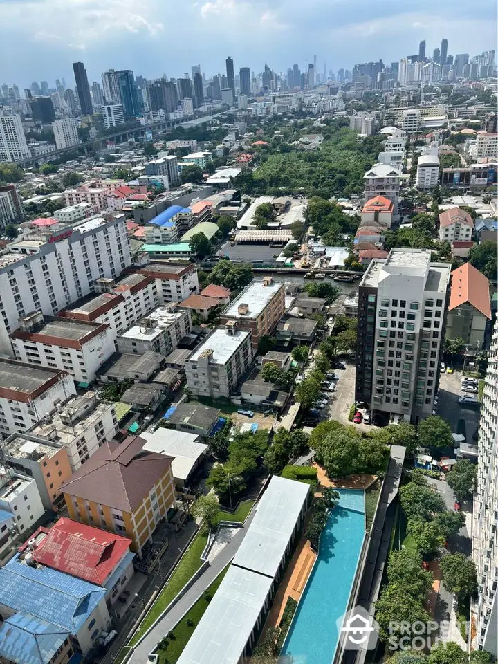 Stunning cityscape view with modern buildings and lush greenery, showcasing urban living at its finest.