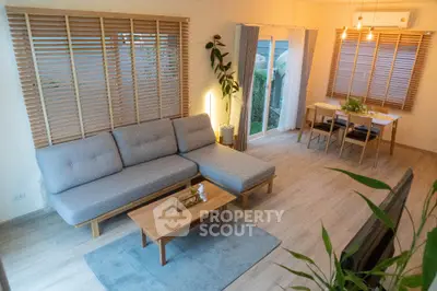 Spacious modern living room with stylish furniture and natural light