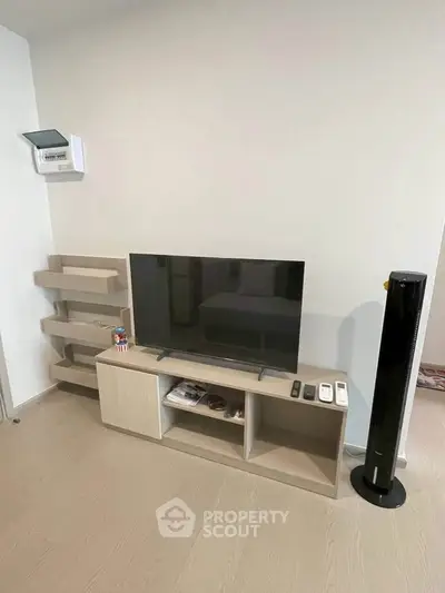 Modern living room with sleek TV stand and contemporary decor
