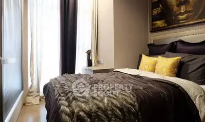 Luxurious bedroom with elegant decor and plush bedding in modern apartment