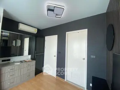Modern bedroom with sleek design and stylish lighting