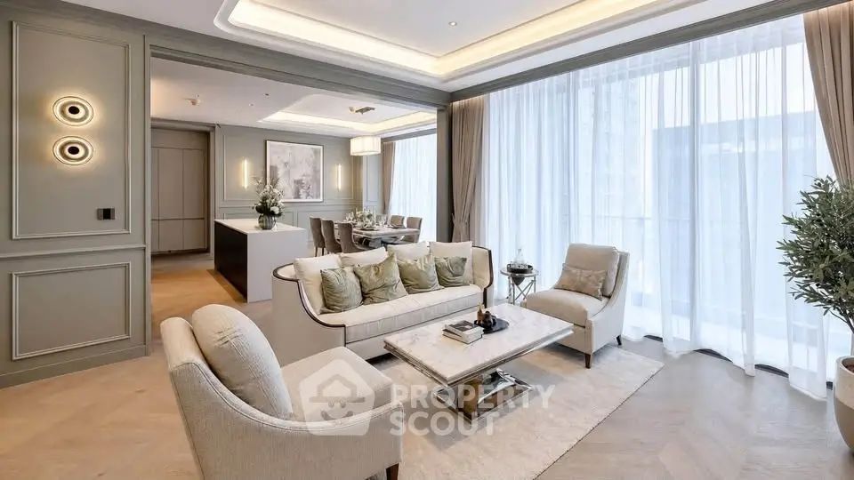 Luxurious living room with elegant decor and open dining area, featuring large windows and stylish furniture.