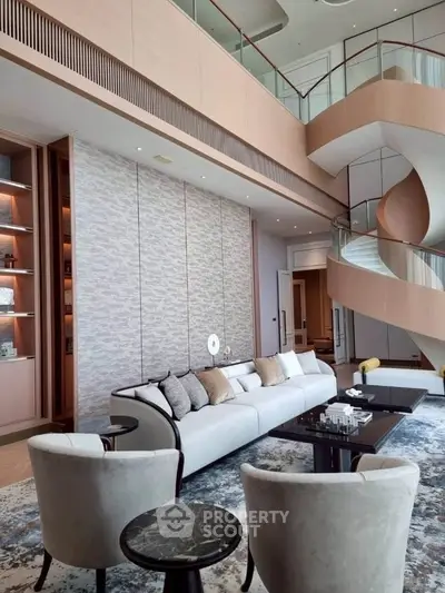 Luxurious modern living room with elegant spiral staircase and plush seating