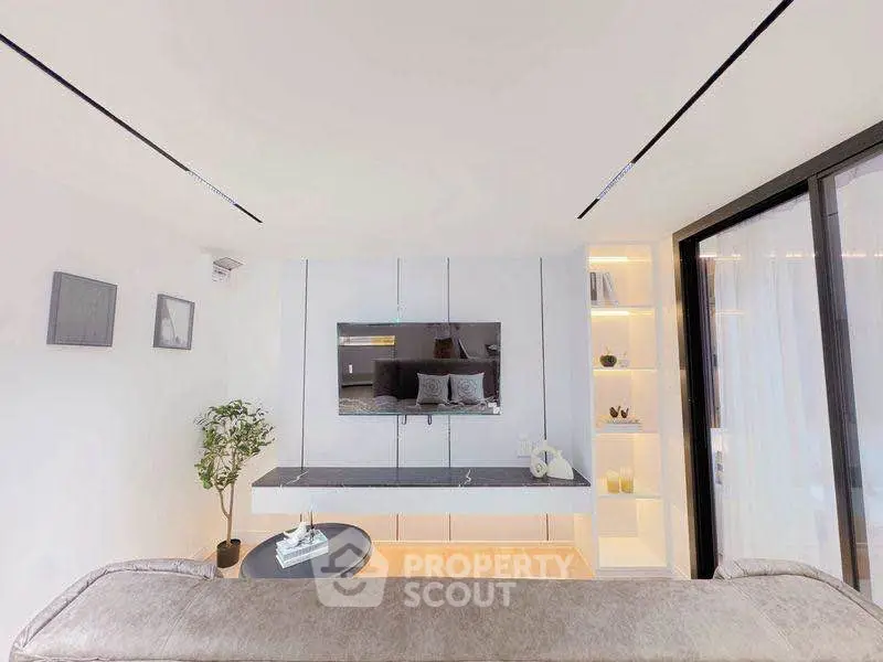 Modern living room with sleek TV setup and stylish decor