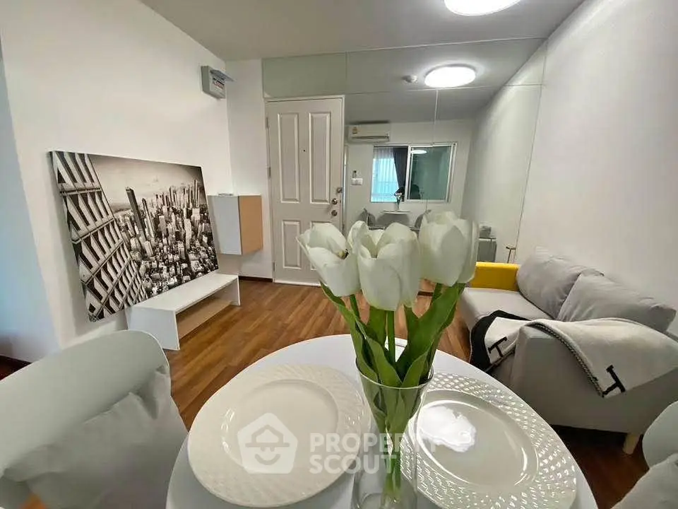 Modern living room with chic decor and cozy seating area