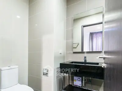 Modern bathroom with sleek fixtures and elegant tile design