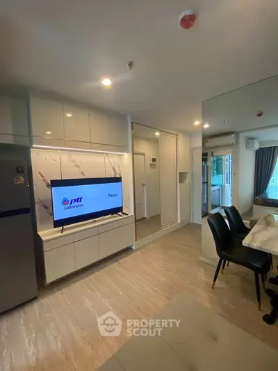Modern living room with sleek design and built-in TV unit