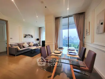 Luxurious open-plan living and dining area with city view, featuring modern furniture and elegant decor.