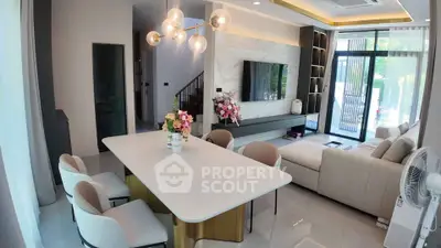 Luxurious modern living room with elegant dining area and stylish decor