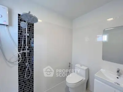 Modern bathroom with sleek shower and contemporary fixtures