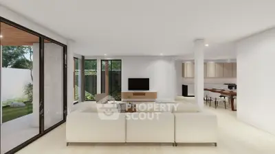 Spacious modern living room with open layout and garden view, featuring elegant furniture and natural light.