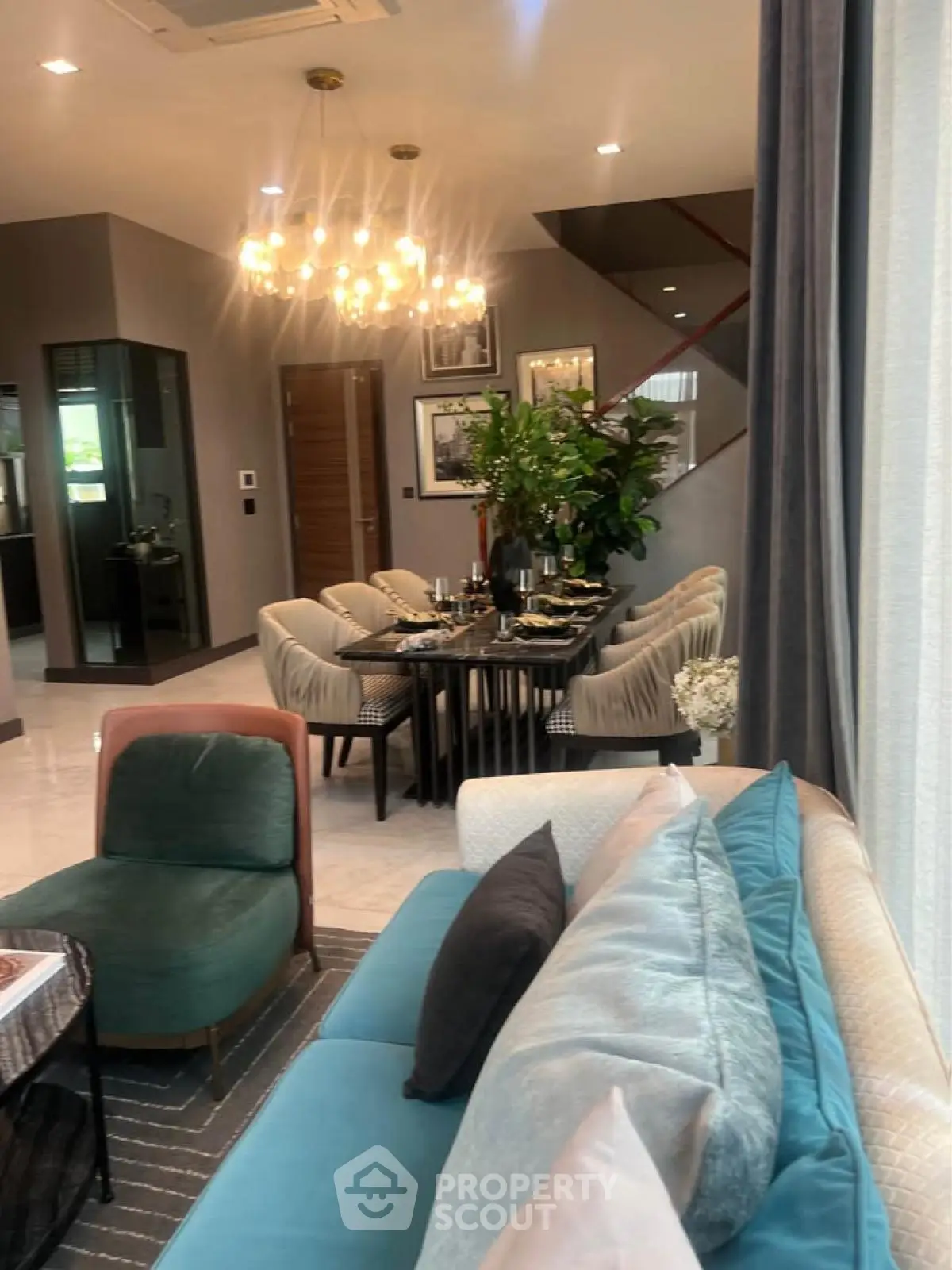 Luxurious modern living room with elegant dining area and stylish decor