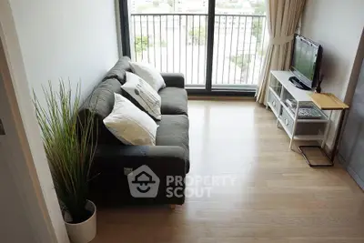 Modern living room with balcony view and stylish decor