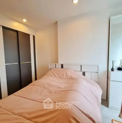 Cozy bedroom with modern design and ample storage space