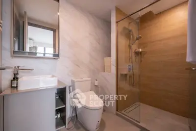 Modern bathroom with sleek design and spacious shower area