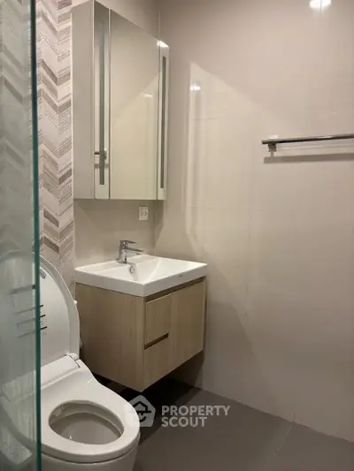 Modern bathroom with sleek fixtures and elegant tile design
