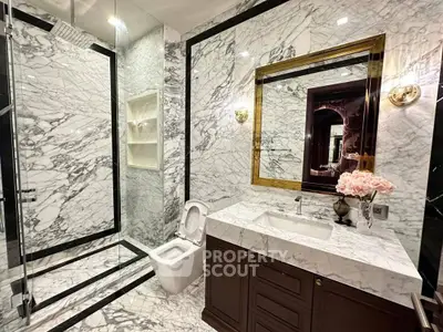 Luxurious marble bathroom with elegant fixtures and modern design