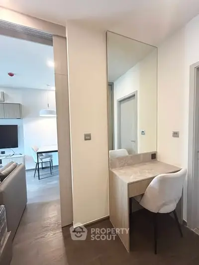 Modern apartment interior with stylish vanity and open living area