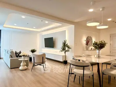 Spacious modern living room with elegant dining area and stylish decor