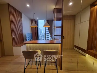 Modern apartment interior with stylish kitchen and city view