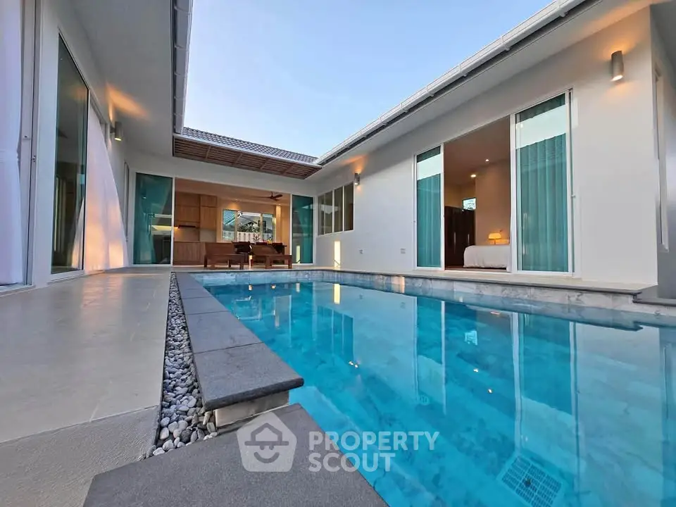 Luxurious modern villa with private pool and elegant interior design, perfect for relaxation and entertainment.