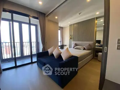 Luxurious bedroom with balcony view in modern apartment