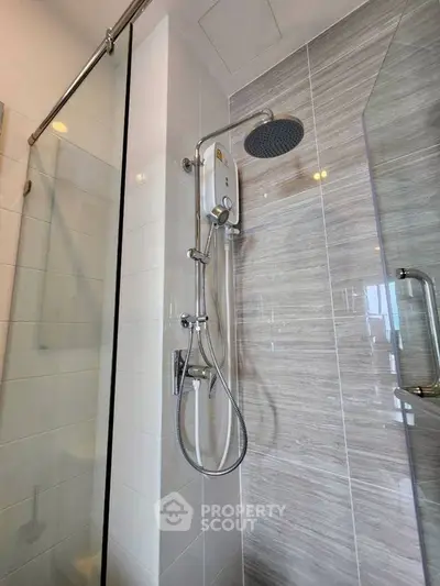 Modern bathroom shower with sleek design and glass door