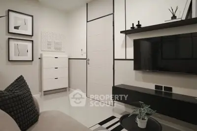 Modern living room with sleek black and white decor, wall-mounted TV, and stylish furniture.