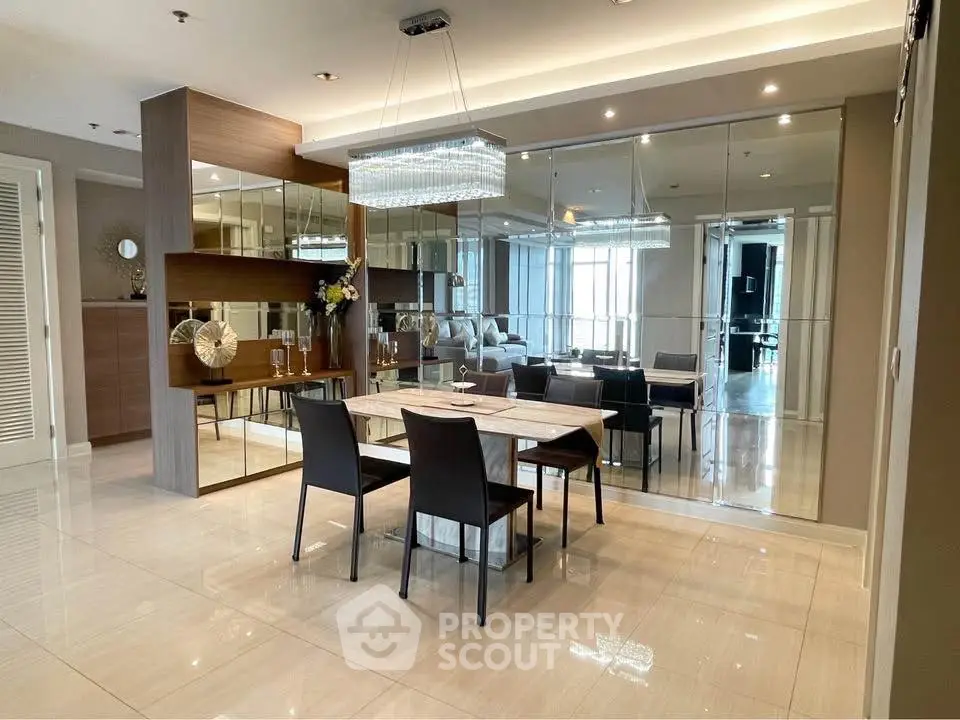 Luxurious dining area with elegant decor and mirrored walls