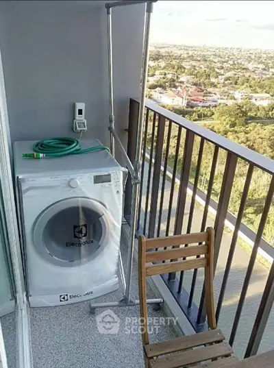 Charming balcony with washer and scenic view, perfect for urban living.