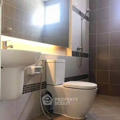 Modern bathroom with sleek fixtures and stylish tile design
