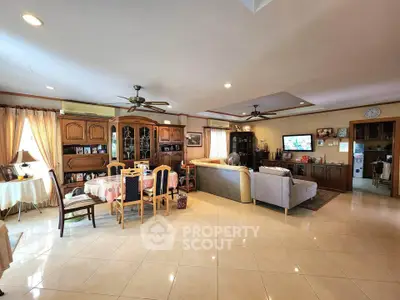 Spacious living room with elegant furniture and open layout for modern living.
