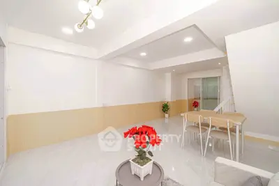 Spacious modern living room with elegant dining area and stylish decor