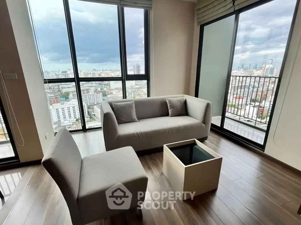 Modern living room with panoramic city view and stylish furniture