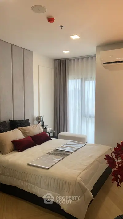 Modern bedroom with elegant decor and natural light