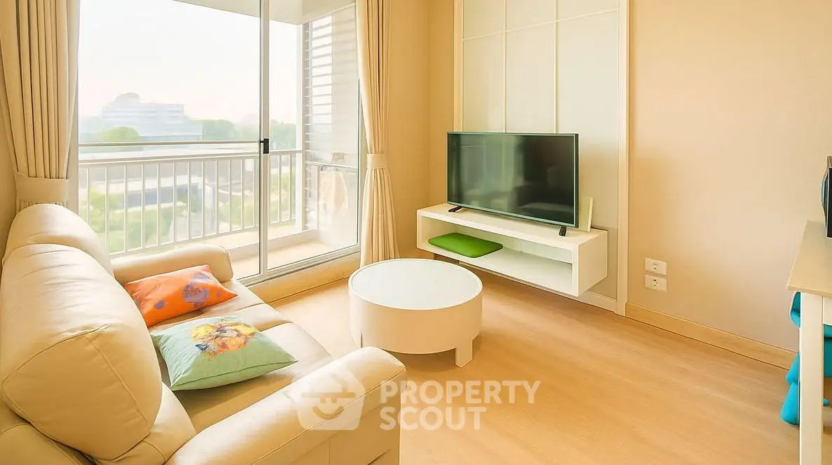 Bright living room with modern decor and balcony view in a stylish apartment.