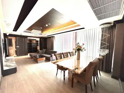 Luxurious modern living room with elegant dining area and stylish decor, perfect for entertaining guests.