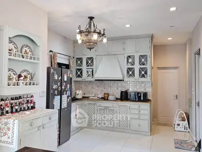 Charming vintage-style kitchen with elegant cabinetry and modern appliances, perfect for culinary enthusiasts.