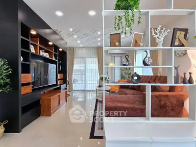 Modern living room with stylish shelving and cozy seating area