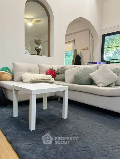 Cozy living room with plush sofa and modern decor