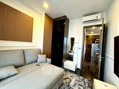 Modern living room with stylish decor and comfortable sofa in a contemporary apartment.