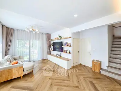 Spacious modern living room with elegant decor and natural light