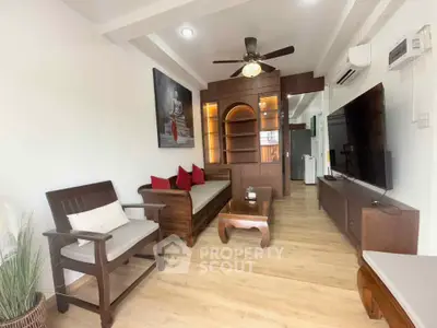 Charming living room with wooden furniture and modern decor