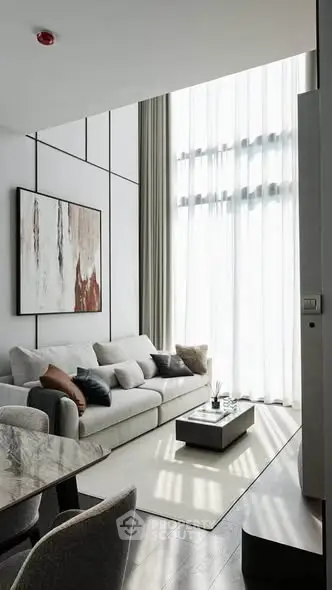 Luxurious modern living room with high ceilings and elegant decor