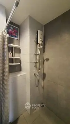 Modern bathroom with sleek shower design and tiled walls