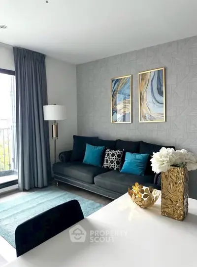 Stylish modern living room with elegant decor and balcony view